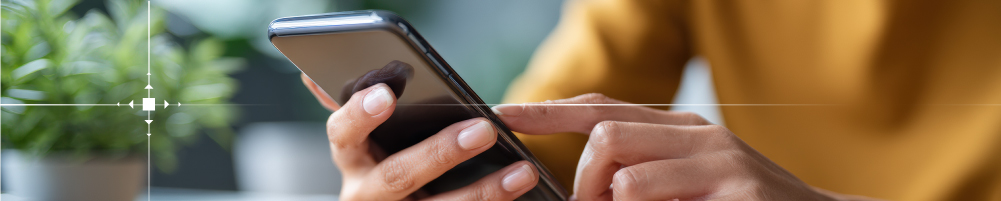 Women texting on her phone.